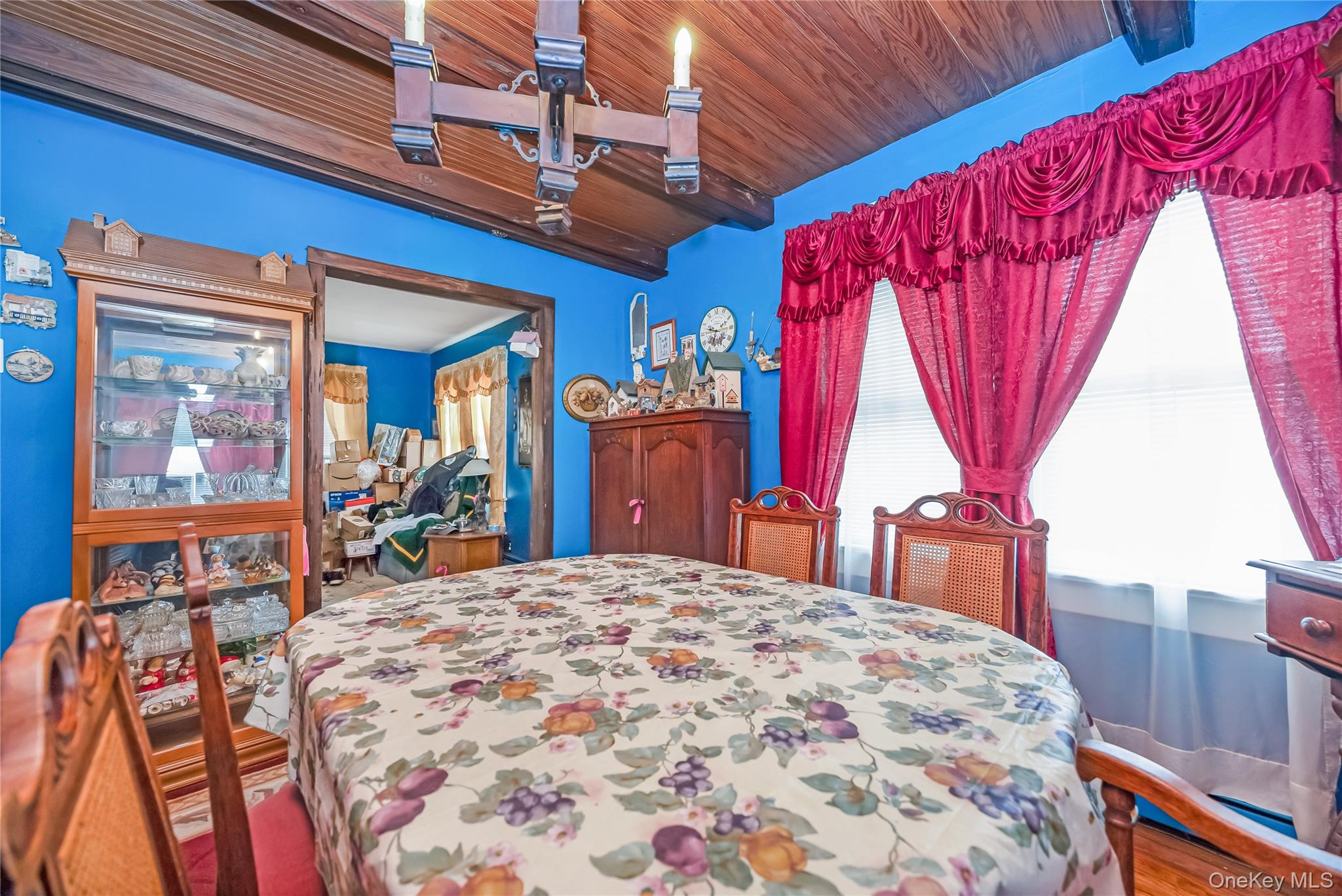 24 Bay 3rd Street Islip, NY 11751 - Photo 22 of 27 a bed sitting in a bedroom next to a window