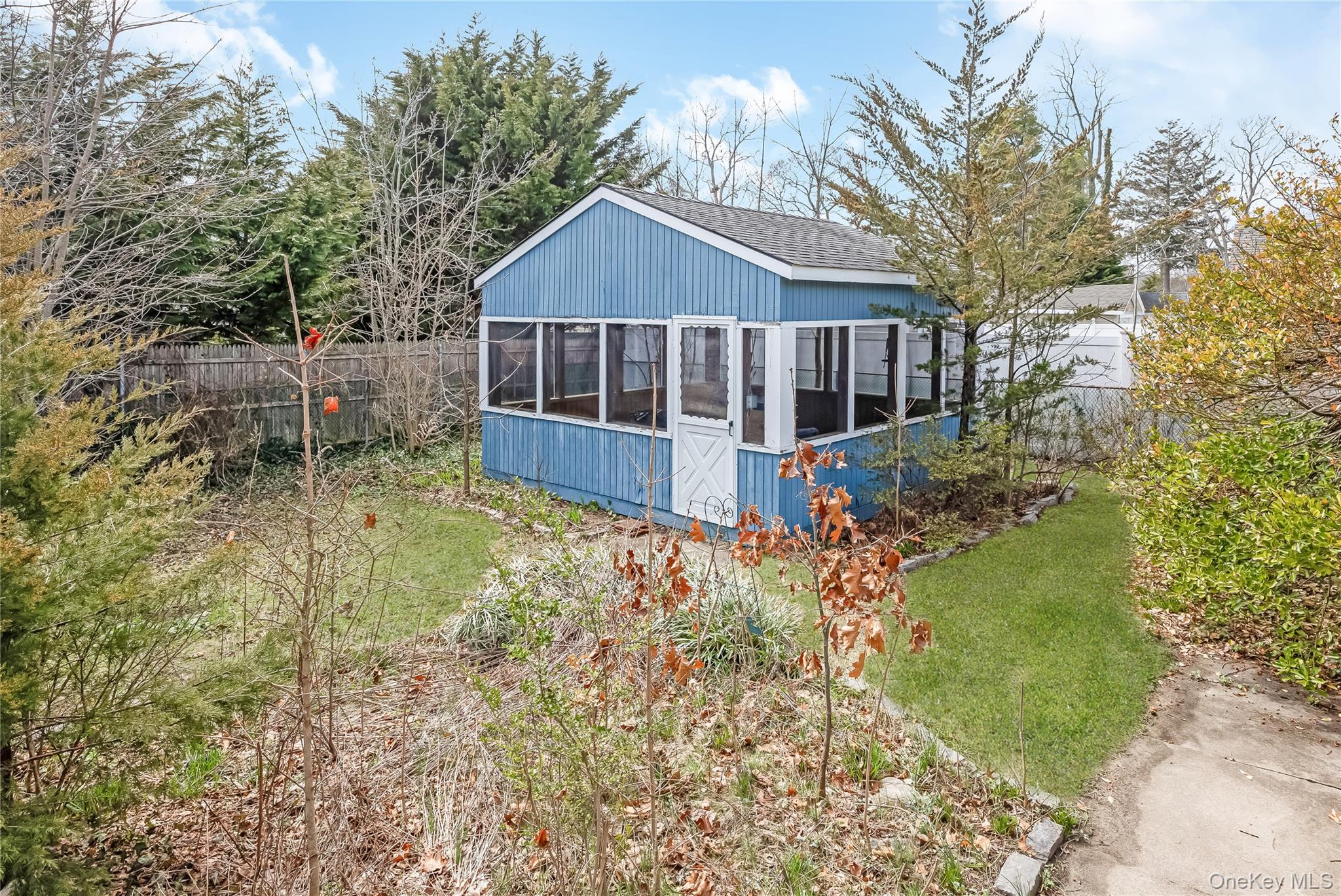 24 Bay 3rd Street Islip, NY 11751 - Photo 26 of 27 a view of a house with yard and roof
