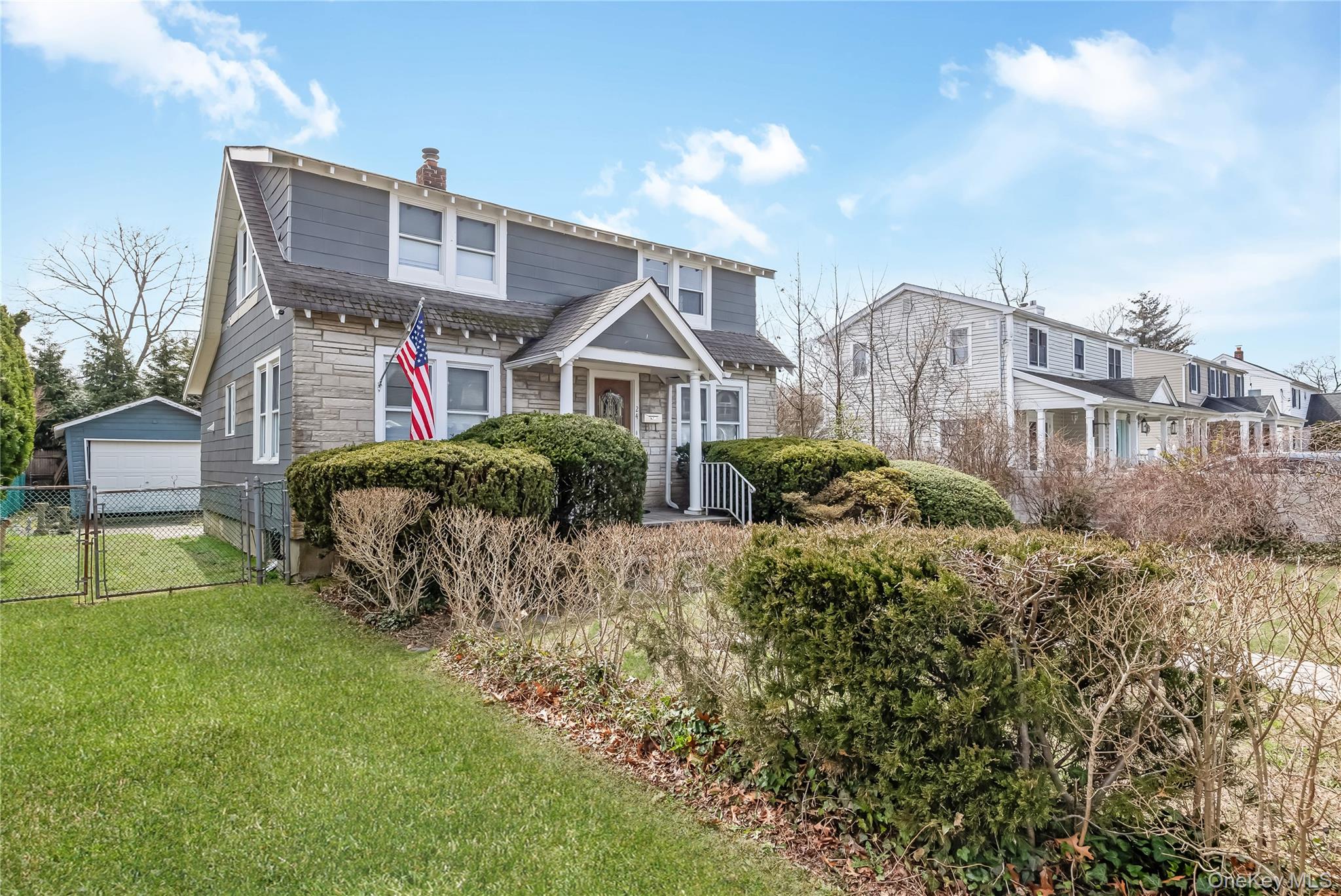 24 Bay 3rd Street Islip, NY 11751 - Photo 27 of 27 a front view of a house with garden