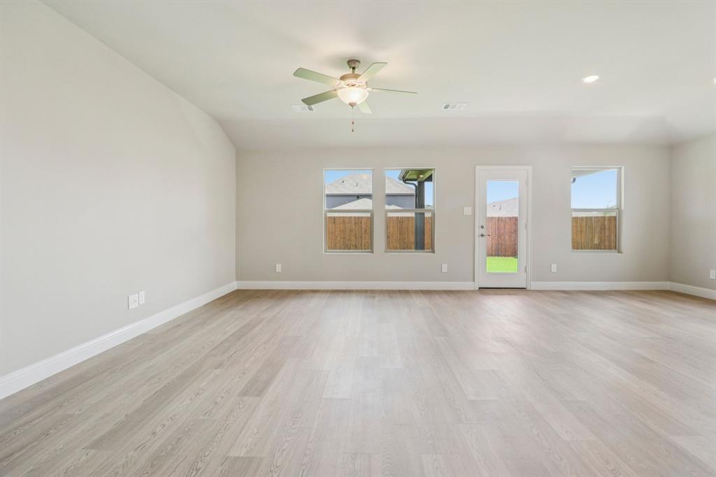 2219 Rannoch Street Sherman, TX 75092 - Photo 12 of 32 a view of an empty room with a window