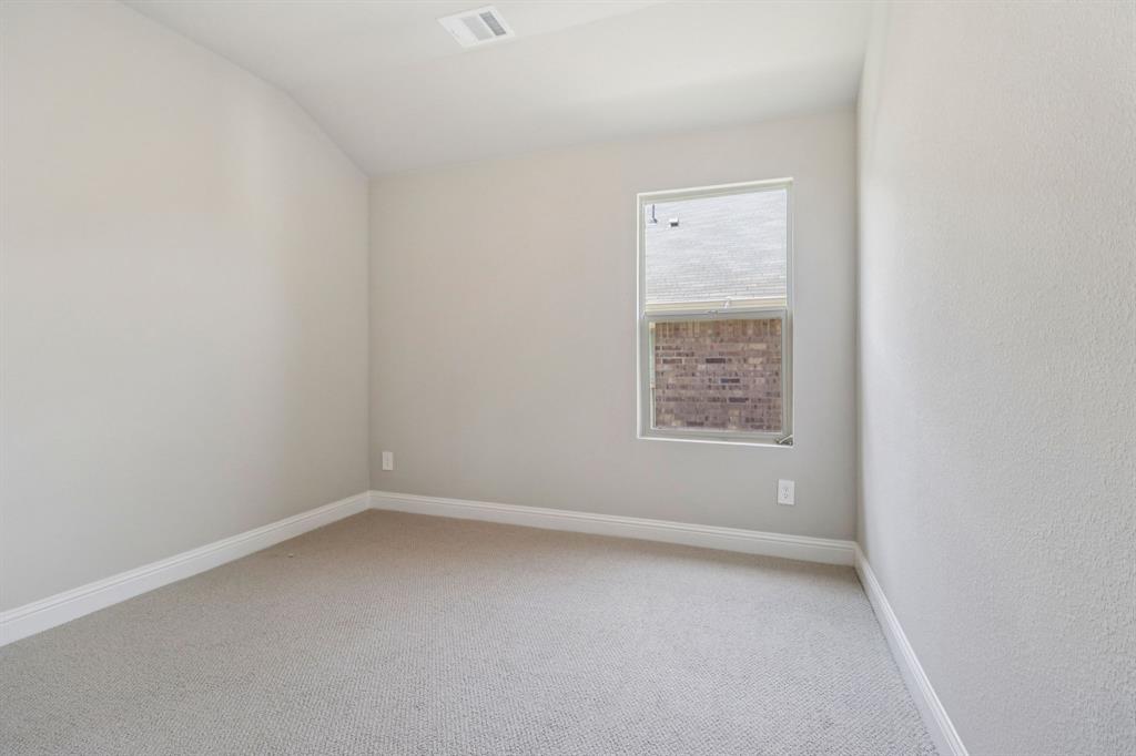 2219 Rannoch Street Sherman, TX 75092 - Photo 27 of 32 an empty room with a window