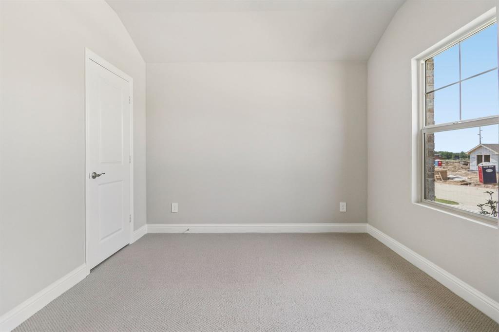 2219 Rannoch Street Sherman, TX 75092 - Photo 30 of 32 an empty room with a window