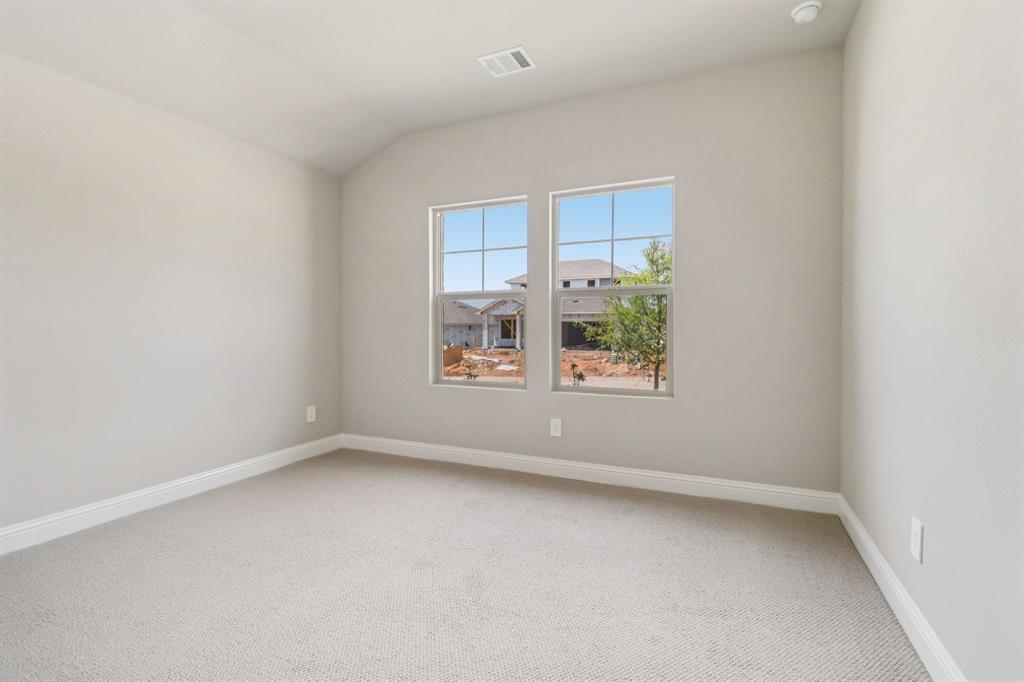 2219 Rannoch Street Sherman, TX 75092 - Photo 31 of 32 an empty room with windows
