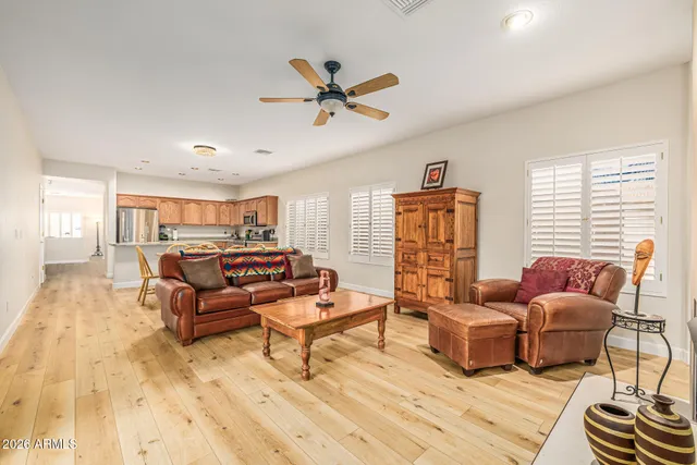 a living room with furniture and a window