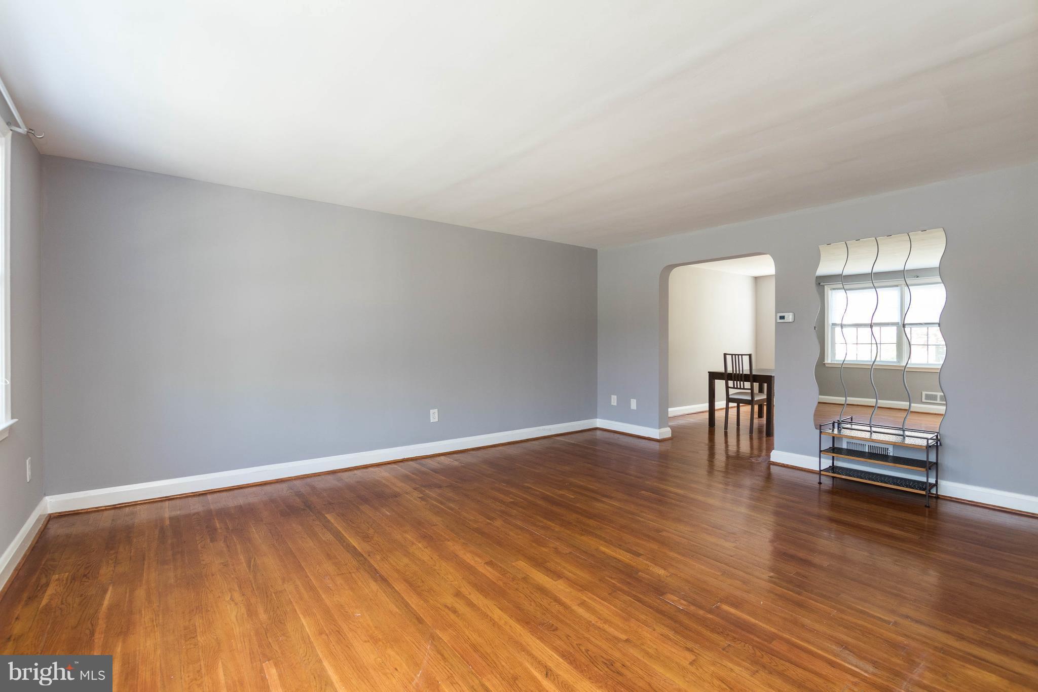 1515 Dellsway Road Baltimore, MD 21286 - Photo 2 of 29 Large living room with gorgeous hardwood flooring