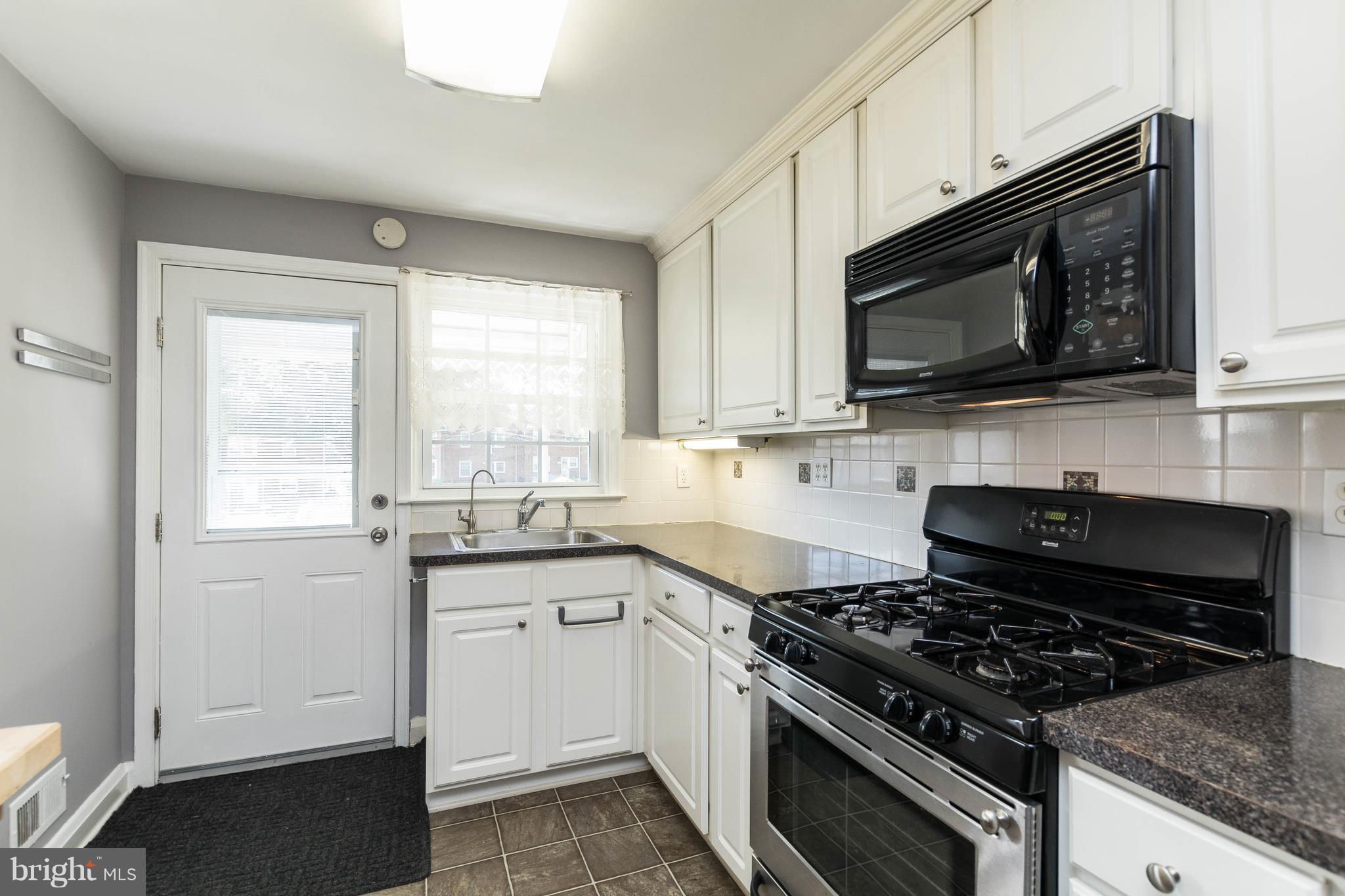 1515 Dellsway Road Baltimore, MD 21286 - Photo 11 of 29 Stainless steel gas stove