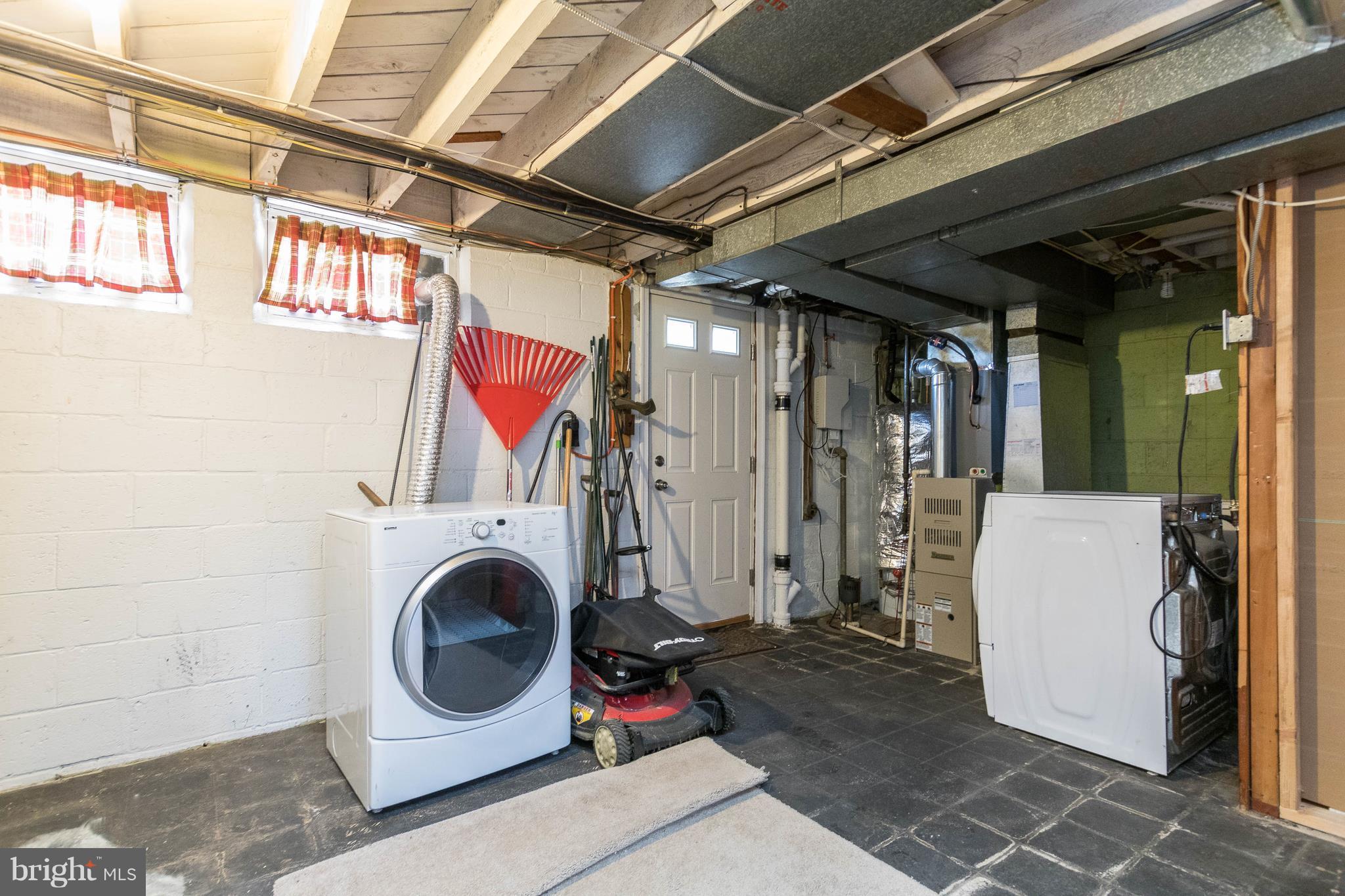 1515 Dellsway Road Baltimore, MD 21286 - Photo 25 of 29 Laundry/storage area with walk-out stairs