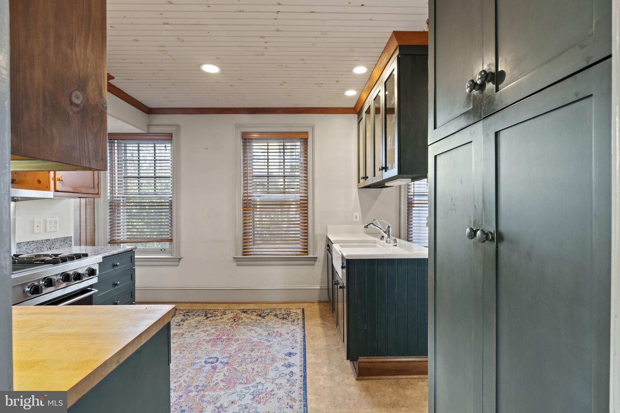 339 Park Avenue Swarthmore, PA 19081 - Photo 13 of 54 a bathroom with a tub sink and mirror