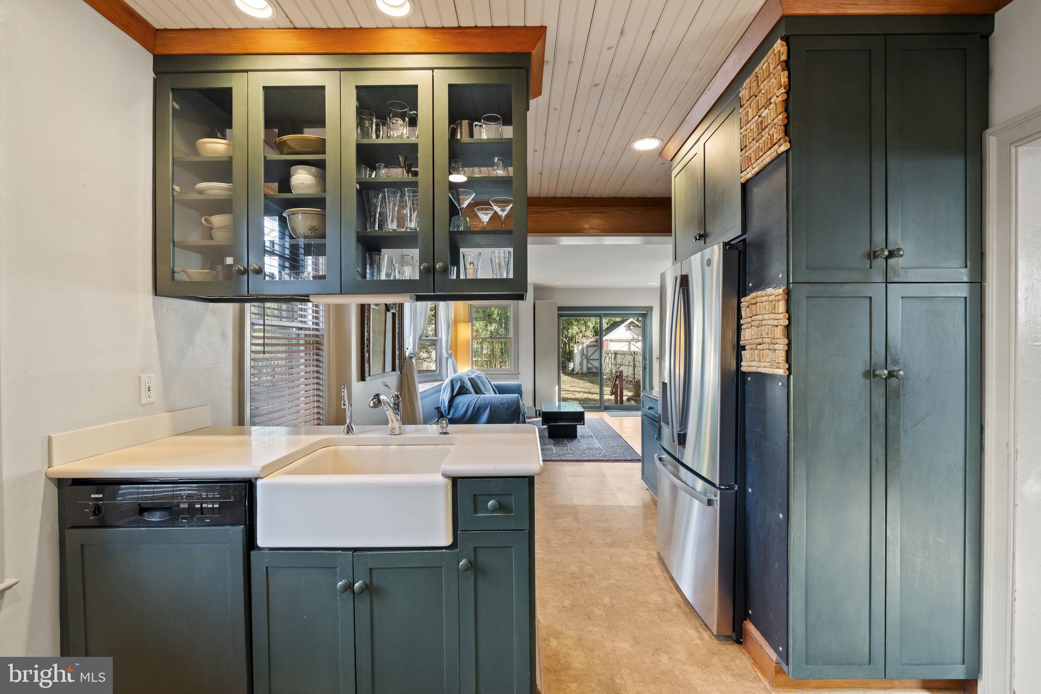 339 Park Avenue Swarthmore, PA 19081 - Photo 16 of 54 a kitchen with a sink and a refrigerator