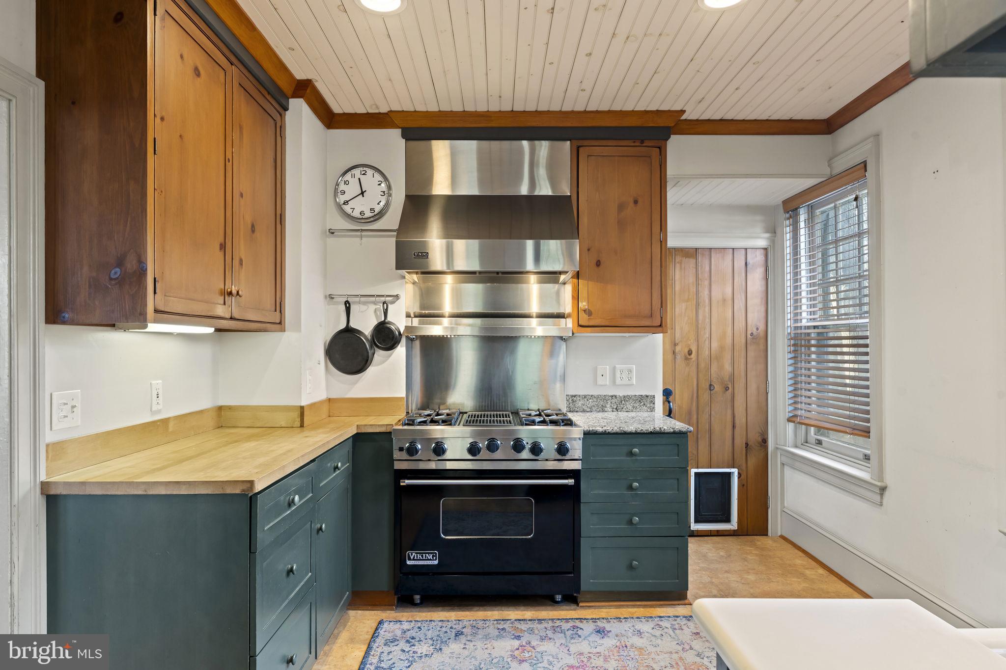 339 Park Avenue Swarthmore, PA 19081 - Photo 17 of 54 a kitchen with a stove and a cabinet