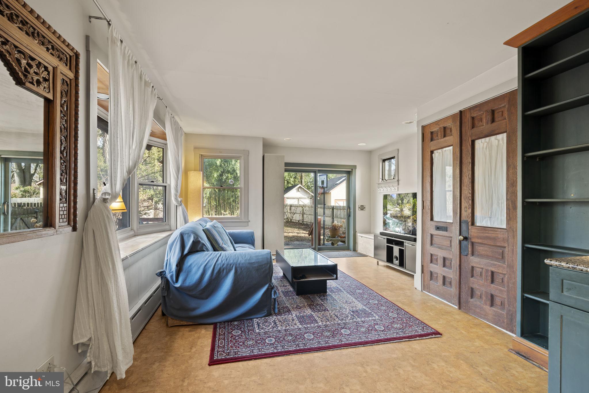339 Park Avenue Swarthmore, PA 19081 - Photo 20 of 54 a living room with furniture and a rug