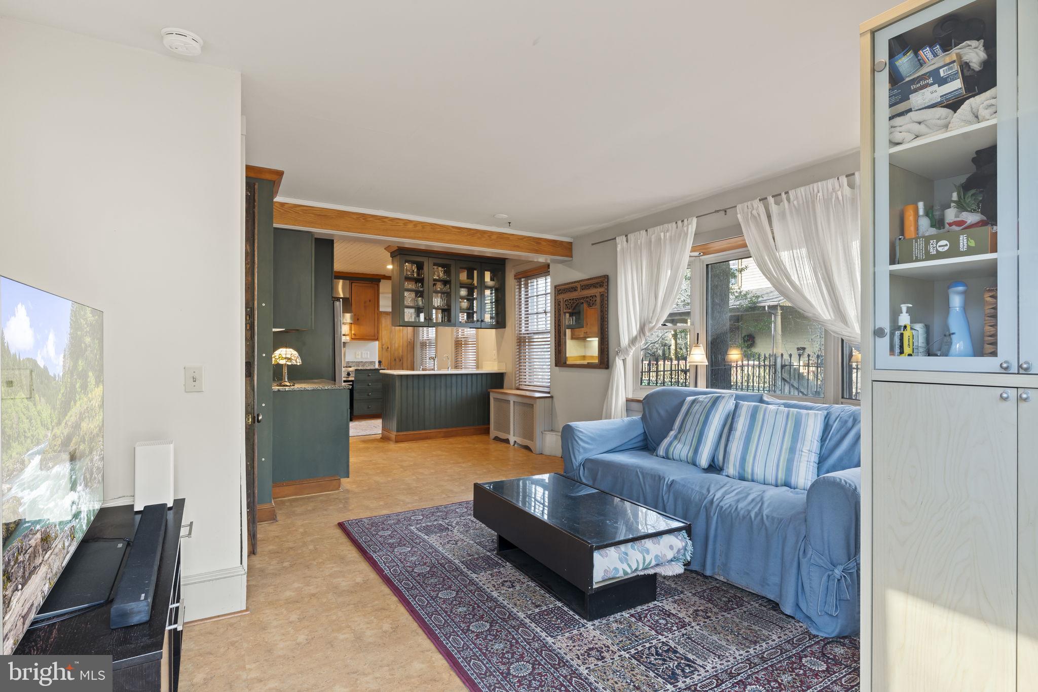 339 Park Avenue Swarthmore, PA 19081 - Photo 23 of 54 a living room with furniture and a large window