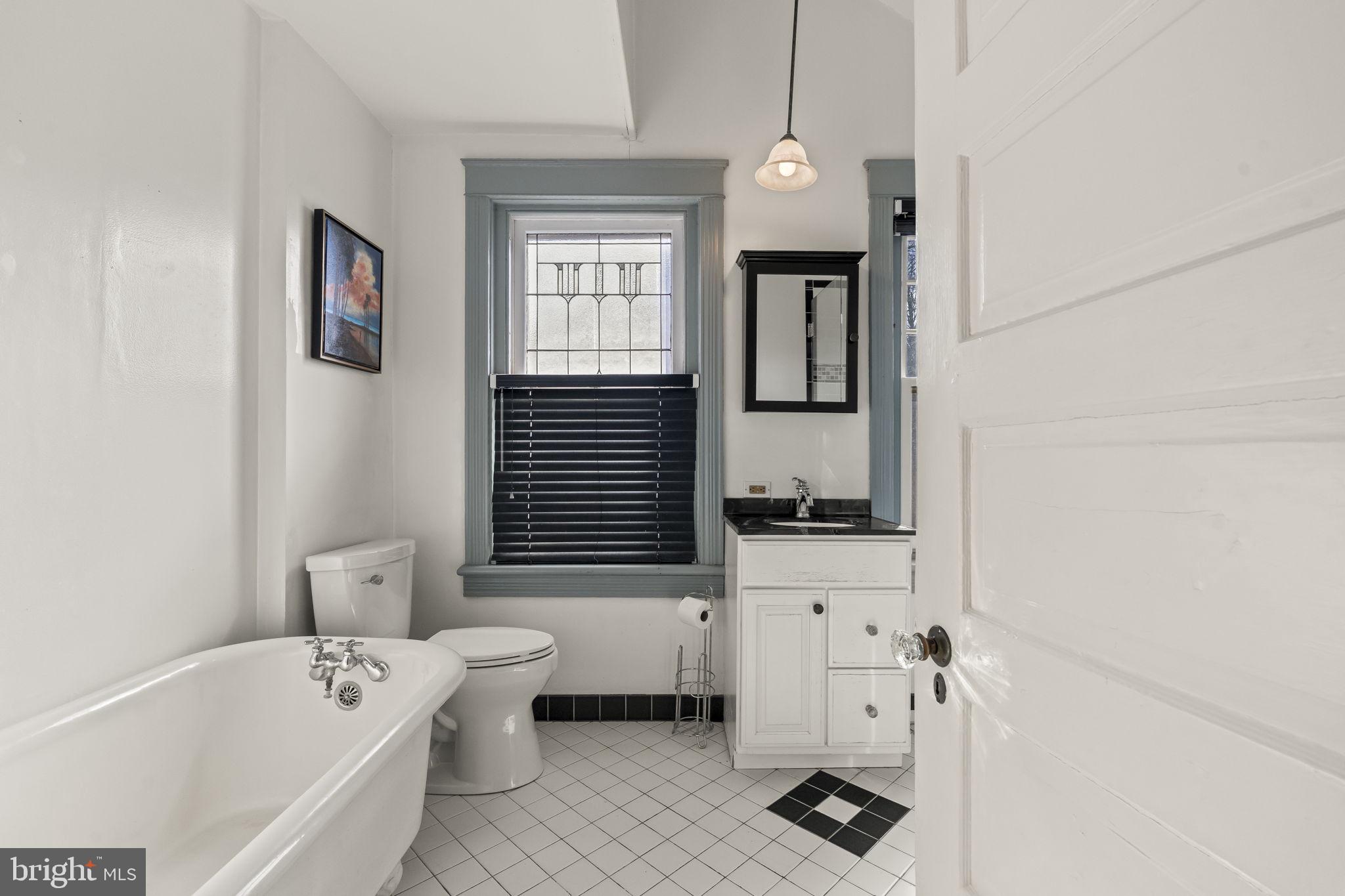 339 Park Avenue Swarthmore, PA 19081 - Photo 25 of 54 a bathroom with a bathtub sink and toilet