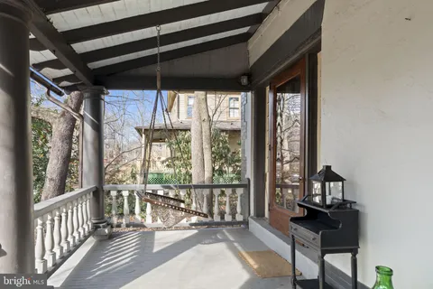 a view of a porch with furniture