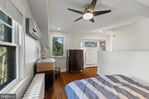 a view of a storage room with racks on the wall