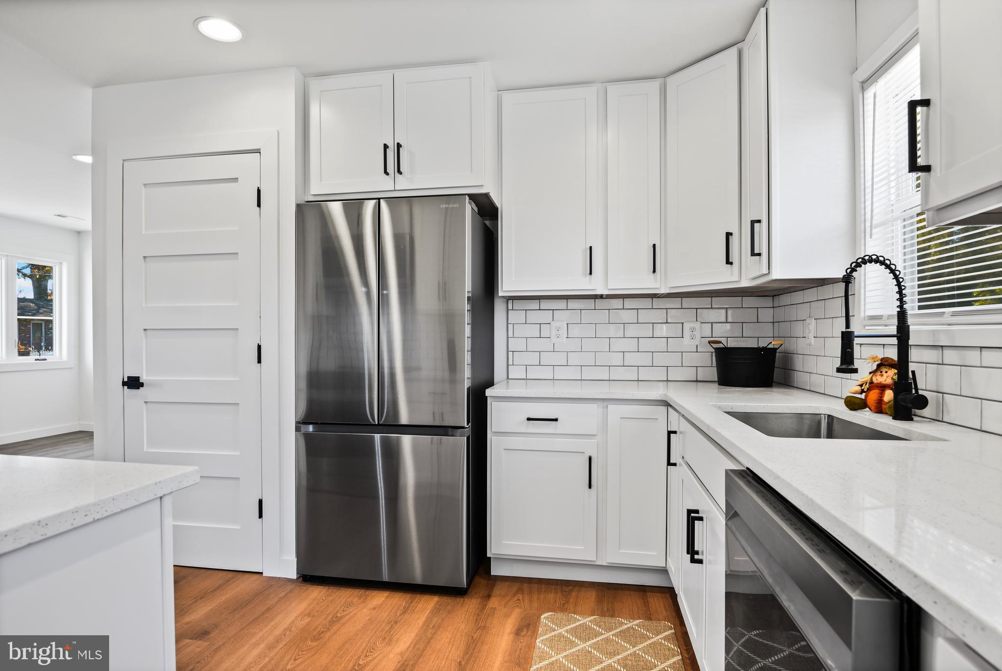8400 Lockwood Road Pasadena, MD 21122 - Photo 26 of 28 Kitchen looking from family room
