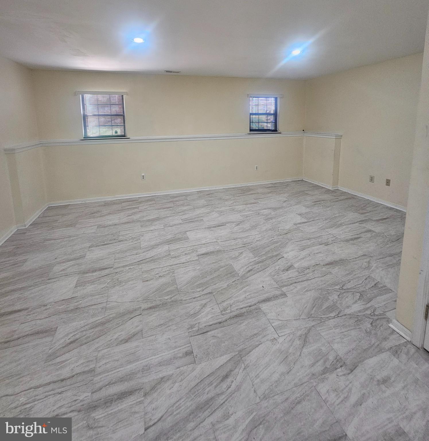 13 Denny Circle Newark, DE 19702 - Photo 16 of 18 an empty room with wooden floor and windows