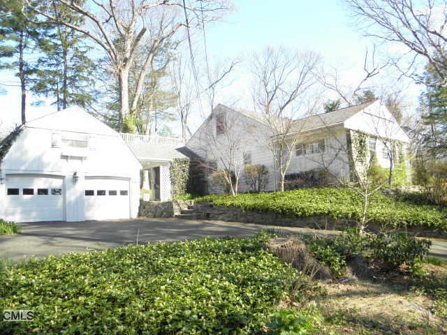 58 Kent Road Wilton, CT 06897 - Photo 1 of 1 a front view of a house with garden