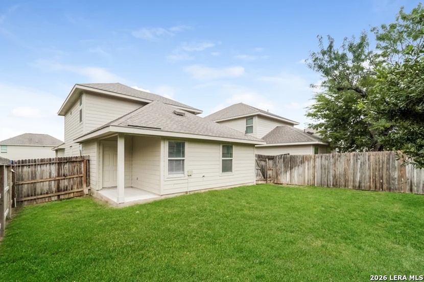 10506 Apple Pie Road San Antonio, TX 78224 - Photo 3 of 14 a view of a yard in front of a house with a large tree