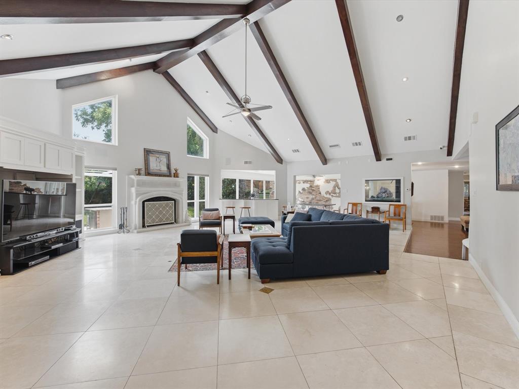 6160 Spring Valley Road Dallas, TX 75240 - Photo 17 of 40 Vaulted white ceilings with exposed dark wood beams