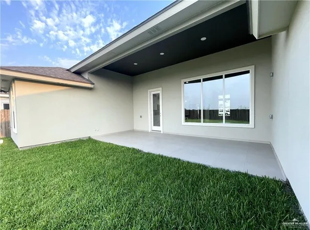 a house view with a garden space