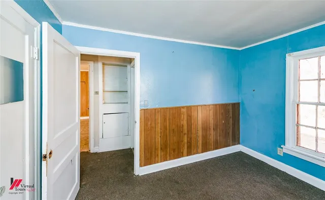 an empty room with windows