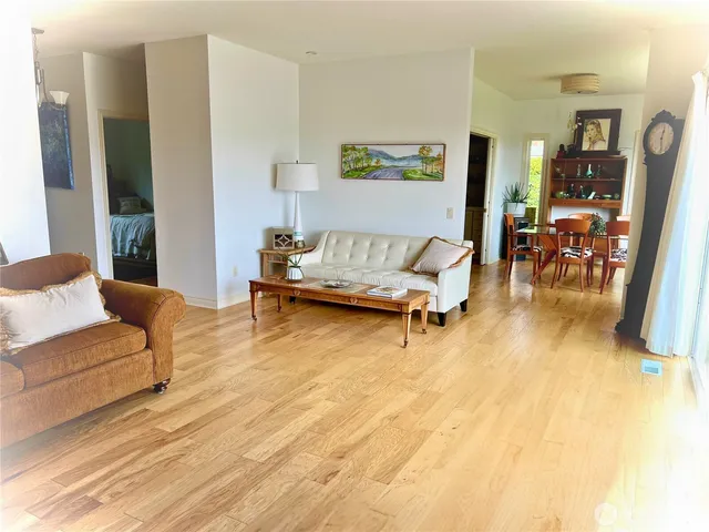 a living room with furniture and a table