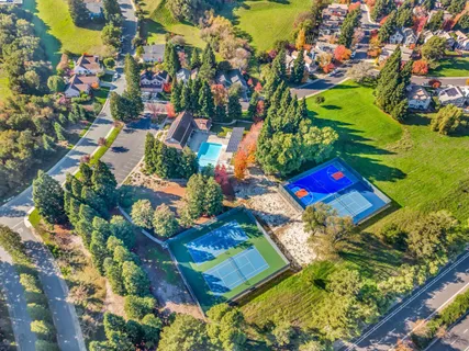 a backyard of a house with lots of green space
