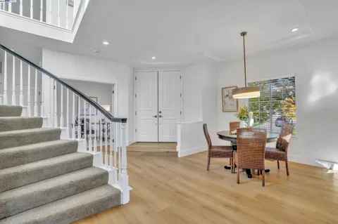 a kitchen with stainless steel appliances a stove sink and cabinets