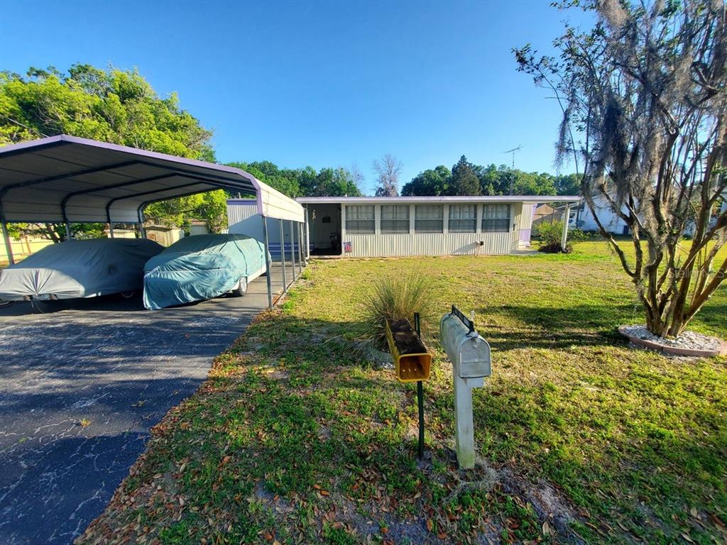 a house view with a garden space