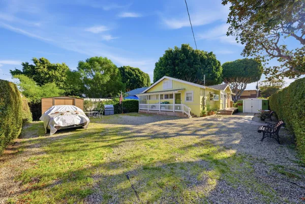a house view with a garden space