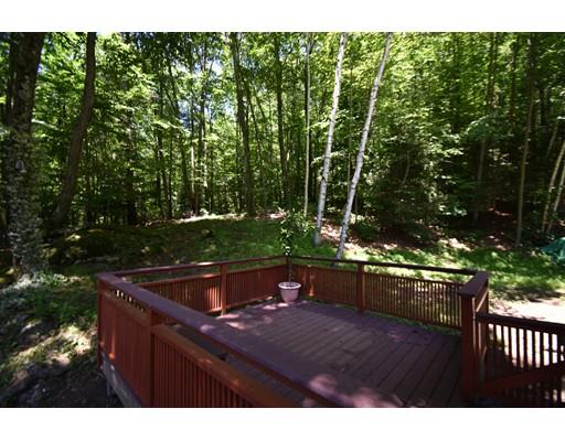 371 Main Road Westhampton, MA 01027 - Photo 8 of 28 a backyard of a house with table and chairs