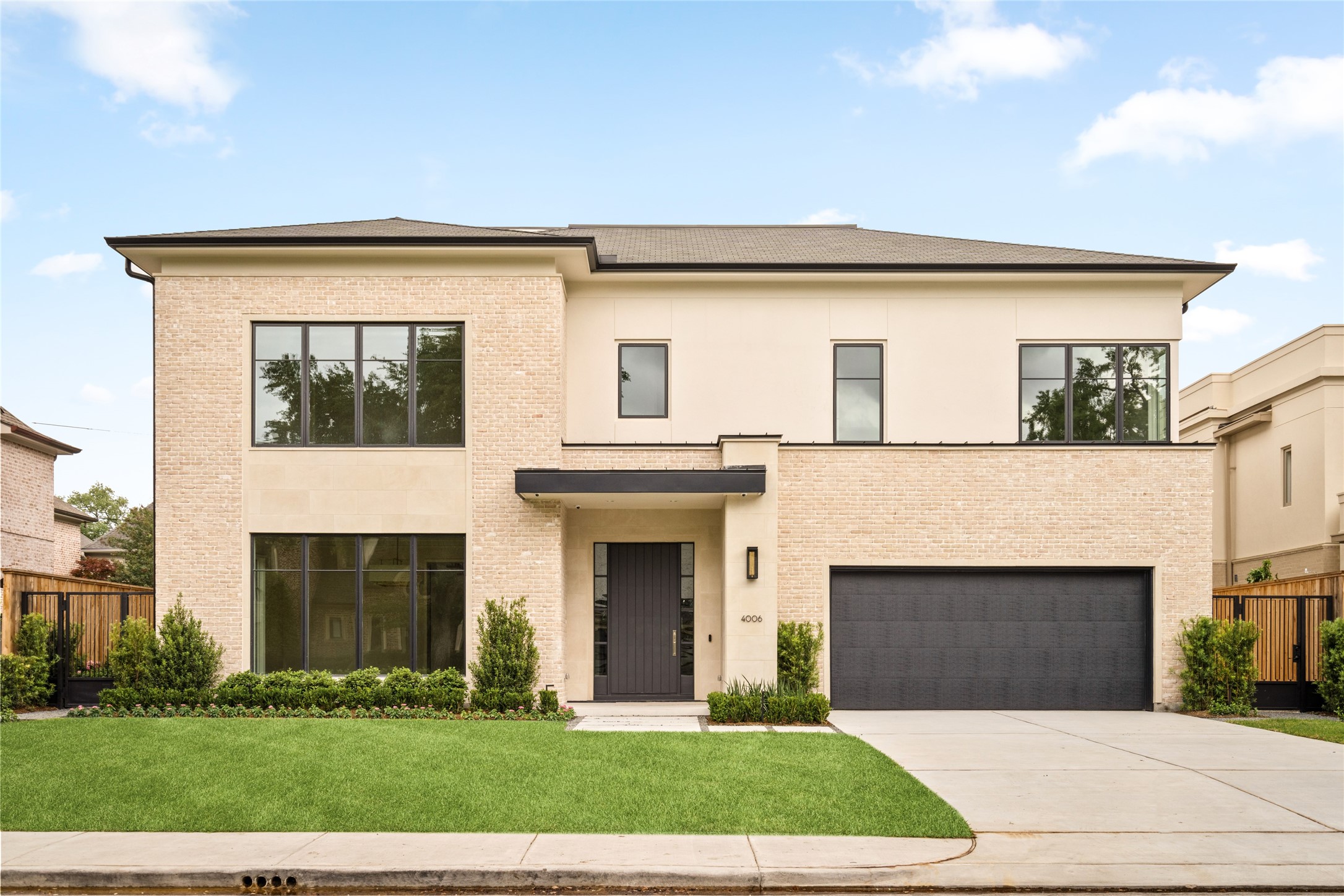 4006 Overbrook Lane Houston, TX 77027 - Photo 1 of 50 Striking new construction by Veranda Custom Homes in Oak Estates, offering over 8,000 square feet of thoughtfully designed luxury with a refined, modern presence.