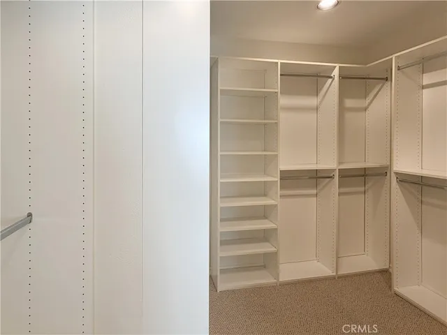 a view of room with walk in closet