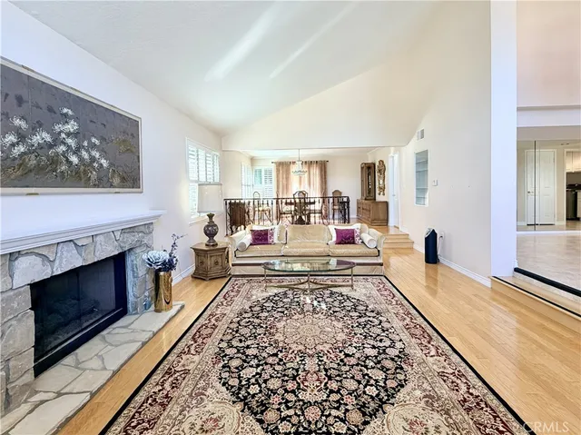 a living room with a couch and a fireplace