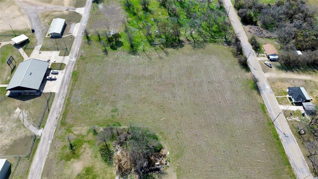 Tbd Lot 1 G Street Meridian, TX 76665 - Photo 4 of 4 an aerial view of a house with a yard