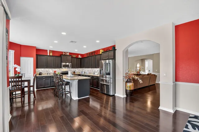 a kitchen with sink and cabinets