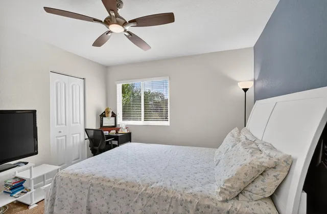 a view of a dinning table and chairs in the patio