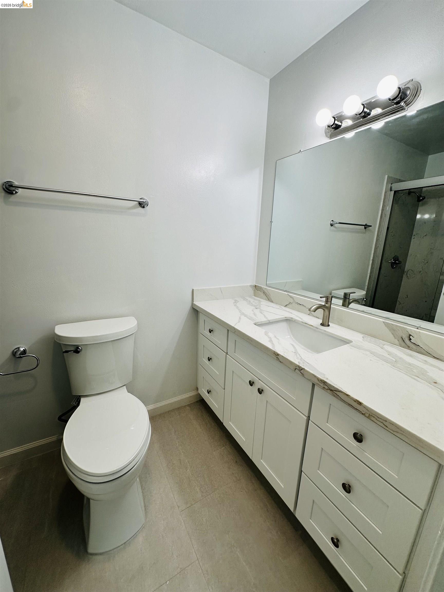 9005 Alcosta Boulevard, Unit 189 San Ramon, CA 94583 - Photo 6 of 20 Bathroom featuring vanity, a stall shower, and light tile patterned floors