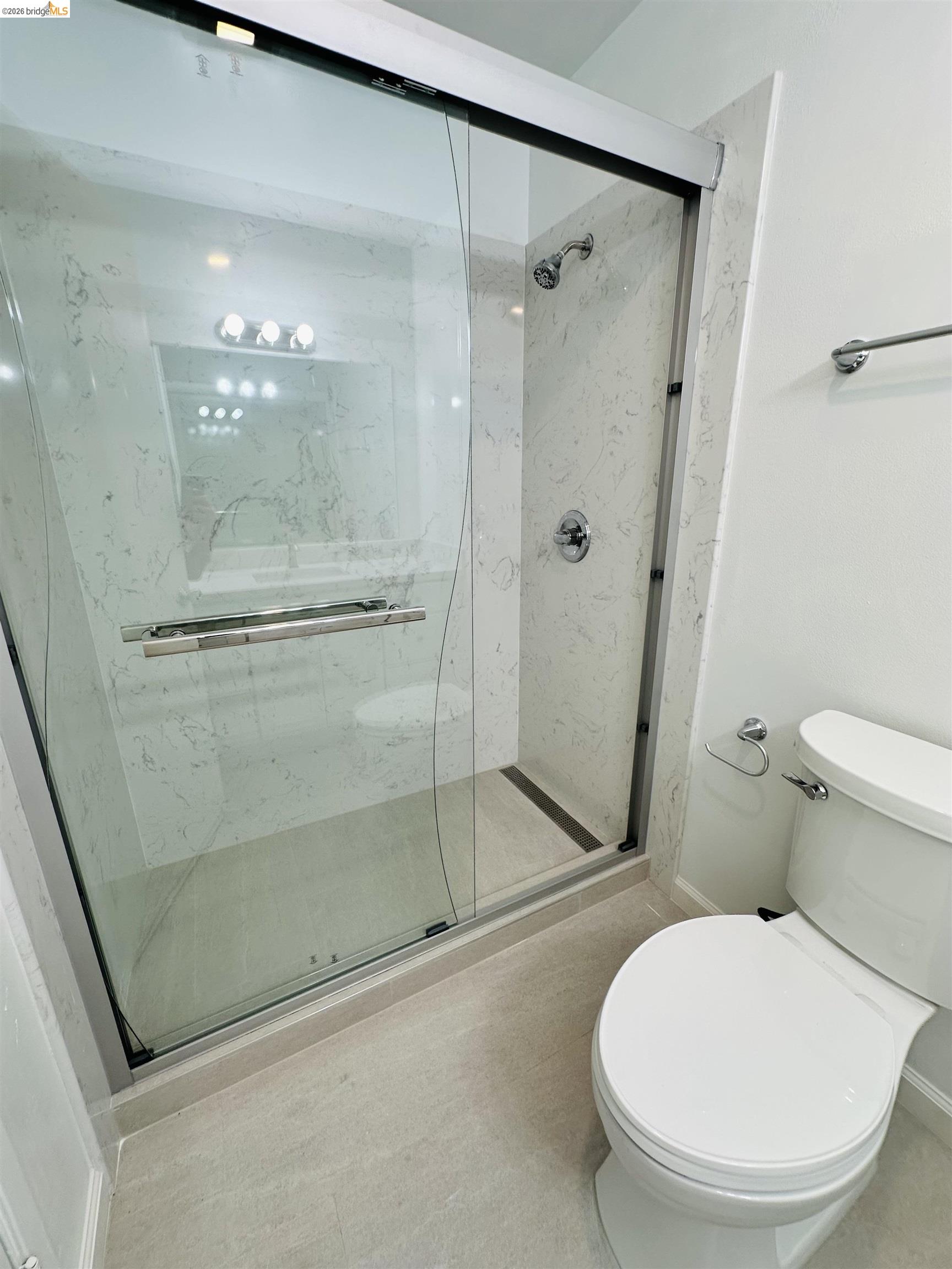 9005 Alcosta Boulevard, Unit 189 San Ramon, CA 94583 - Photo 7 of 20 Full bathroom with toilet and a marble finish shower