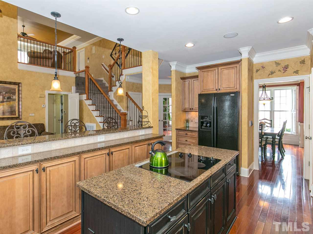 2725 Peachleaf Street Raleigh, NC 27614 - Photo 5 of 25 Kitchen offers 42" Maple Cabinets and Raised Breakfast Bar