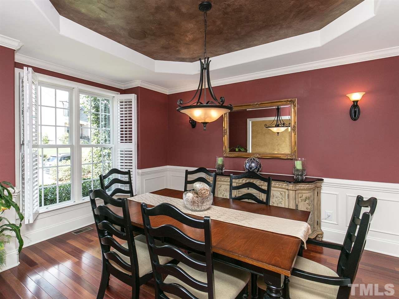 2725 Peachleaf Street Raleigh, NC 27614 - Photo 8 of 25 Extensive Trim and Plantation Shutters in the Formal Dining Room