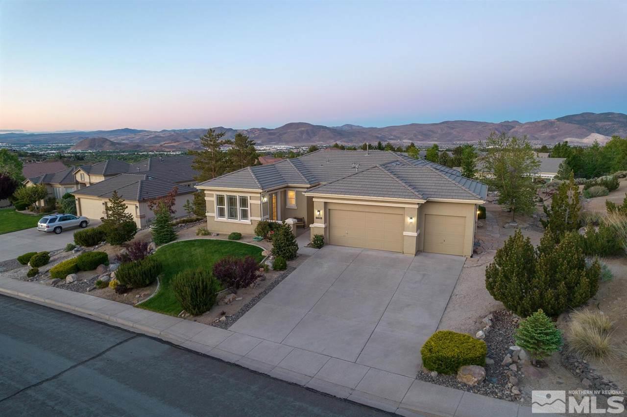 5633 North White Sands Road Reno, NV 89511 - Photo 2 of 40 an aerial view of a house with a garden
