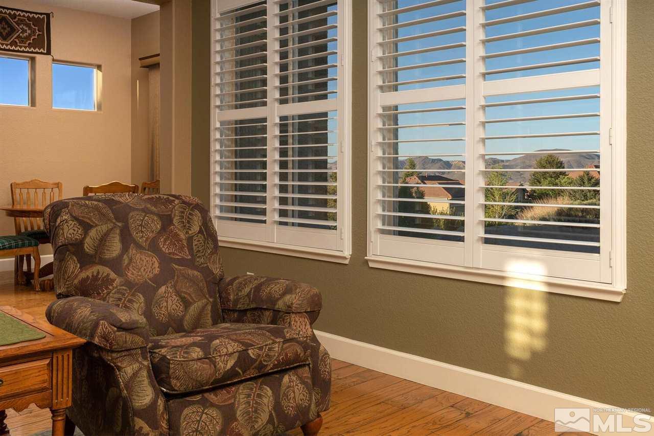 5633 North White Sands Road Reno, NV 89511 - Photo 40 of 40 a living room with furniture and a window