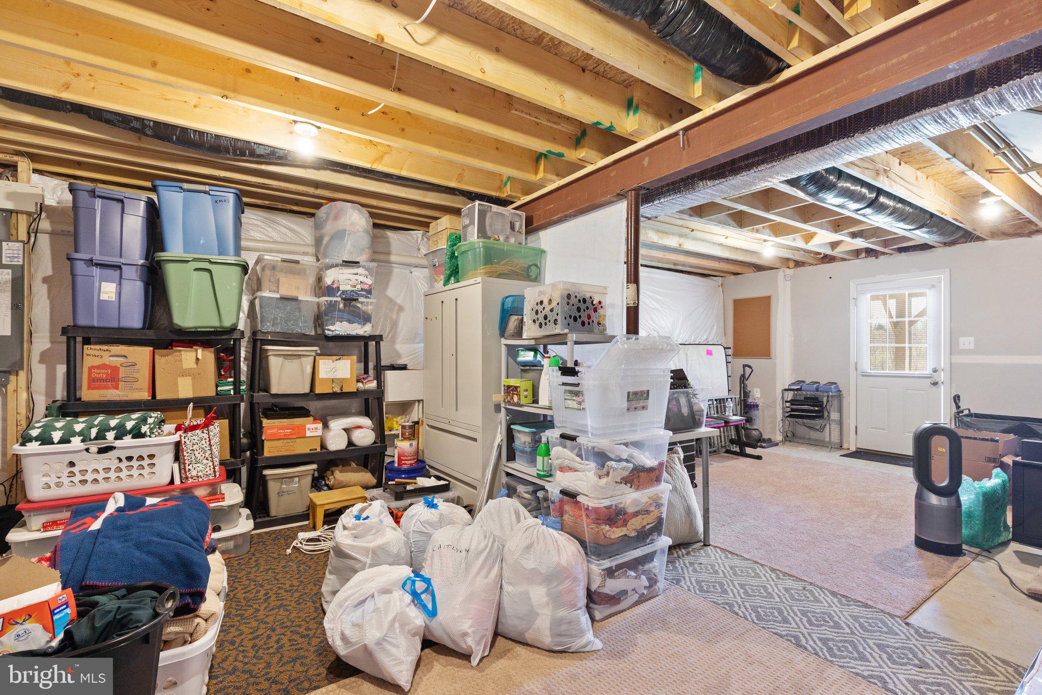101 Williams Street Strasburg, VA 22657 - Photo 17 of 21 a living room with furniture and a potted plant