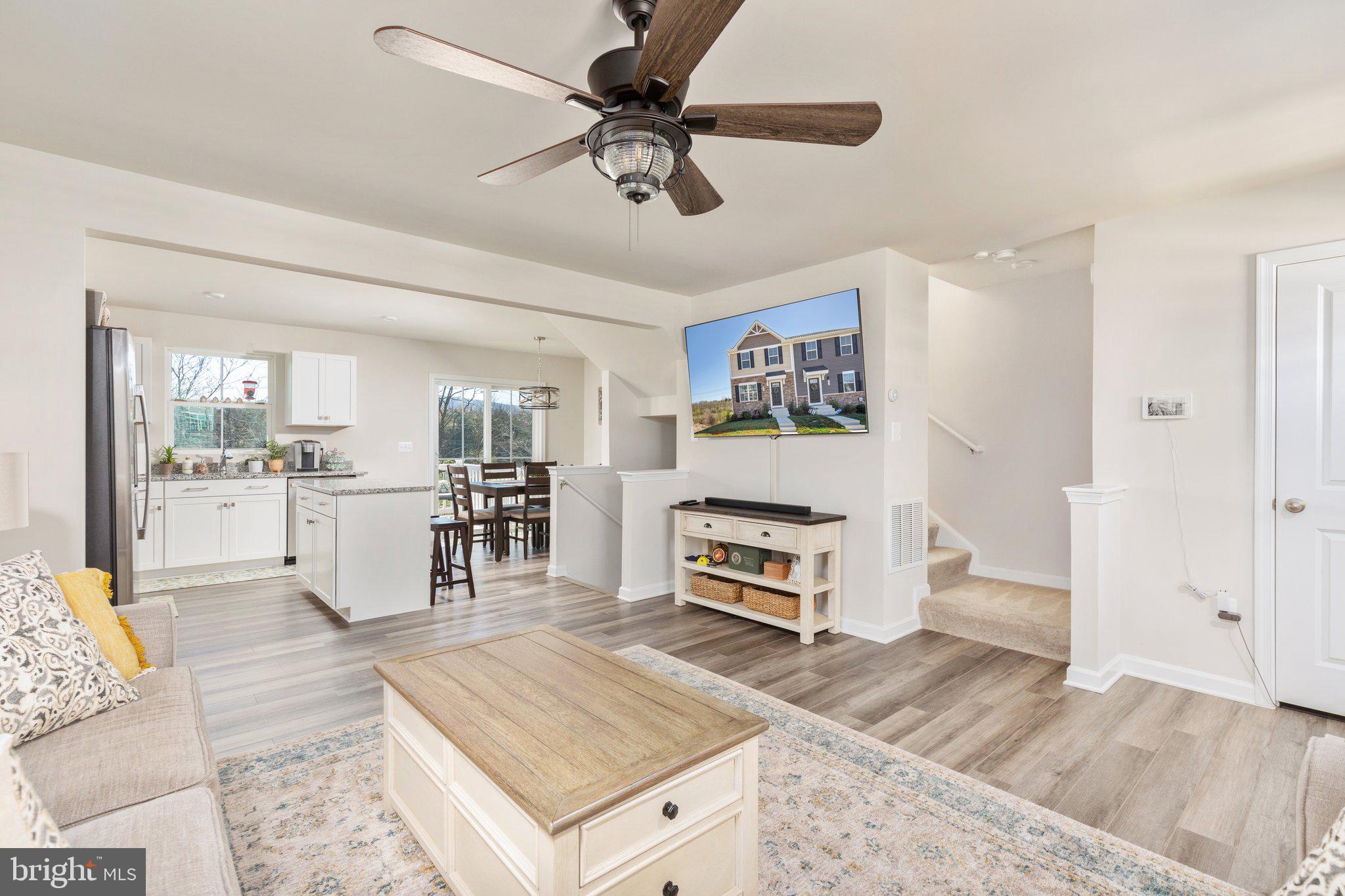 101 Williams Street Strasburg, VA 22657 - Photo 4 of 21 a living room with furniture and a flat screen tv