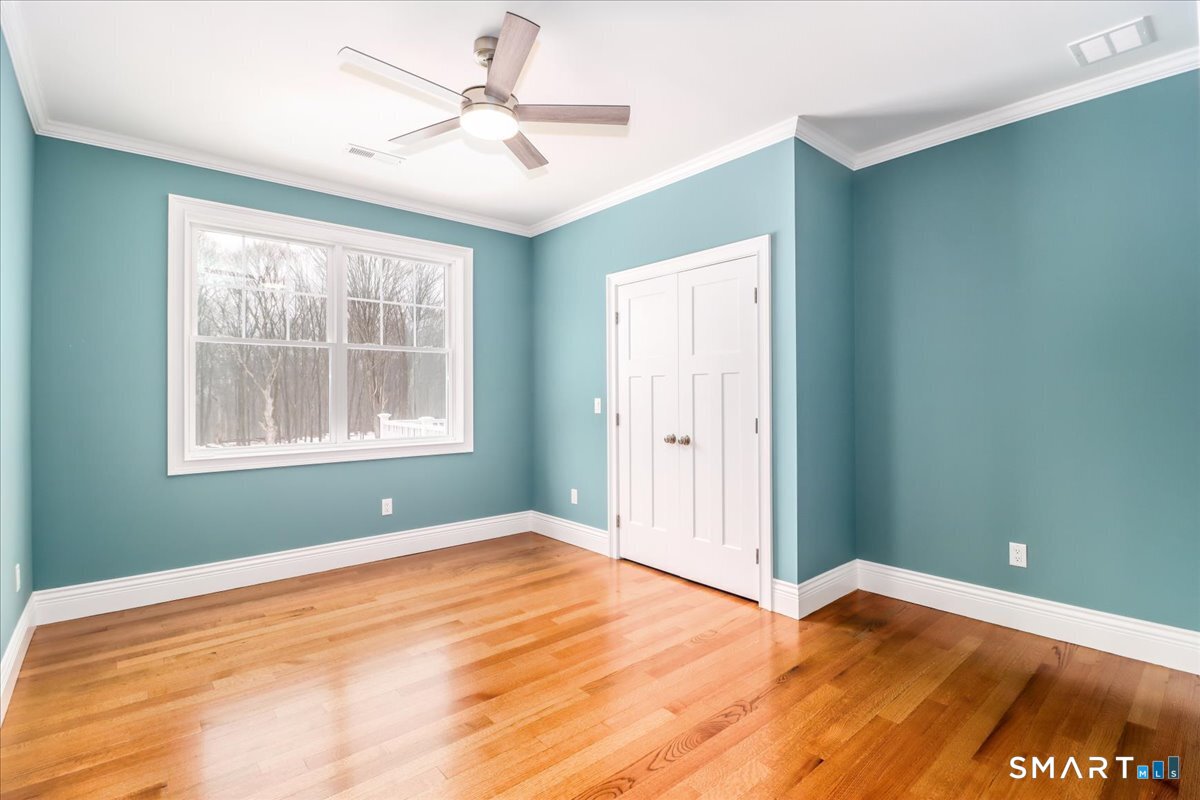 109 Codfish Hill Road Bethel, CT 06801 - Photo 14 of 43 a view of empty room with window and ceiling fan