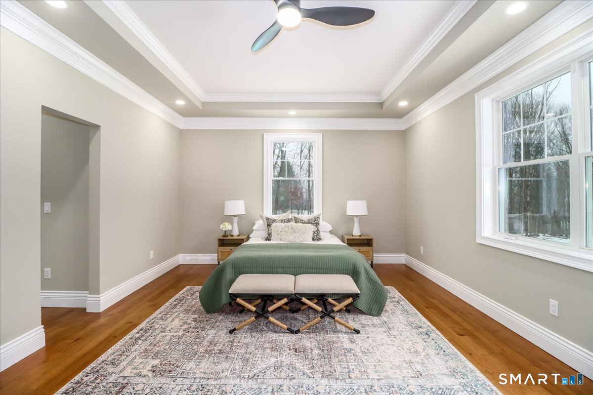 109 Codfish Hill Road Bethel, CT 06801 - Photo 15 of 43 a bed sitting in a bedroom next to a window