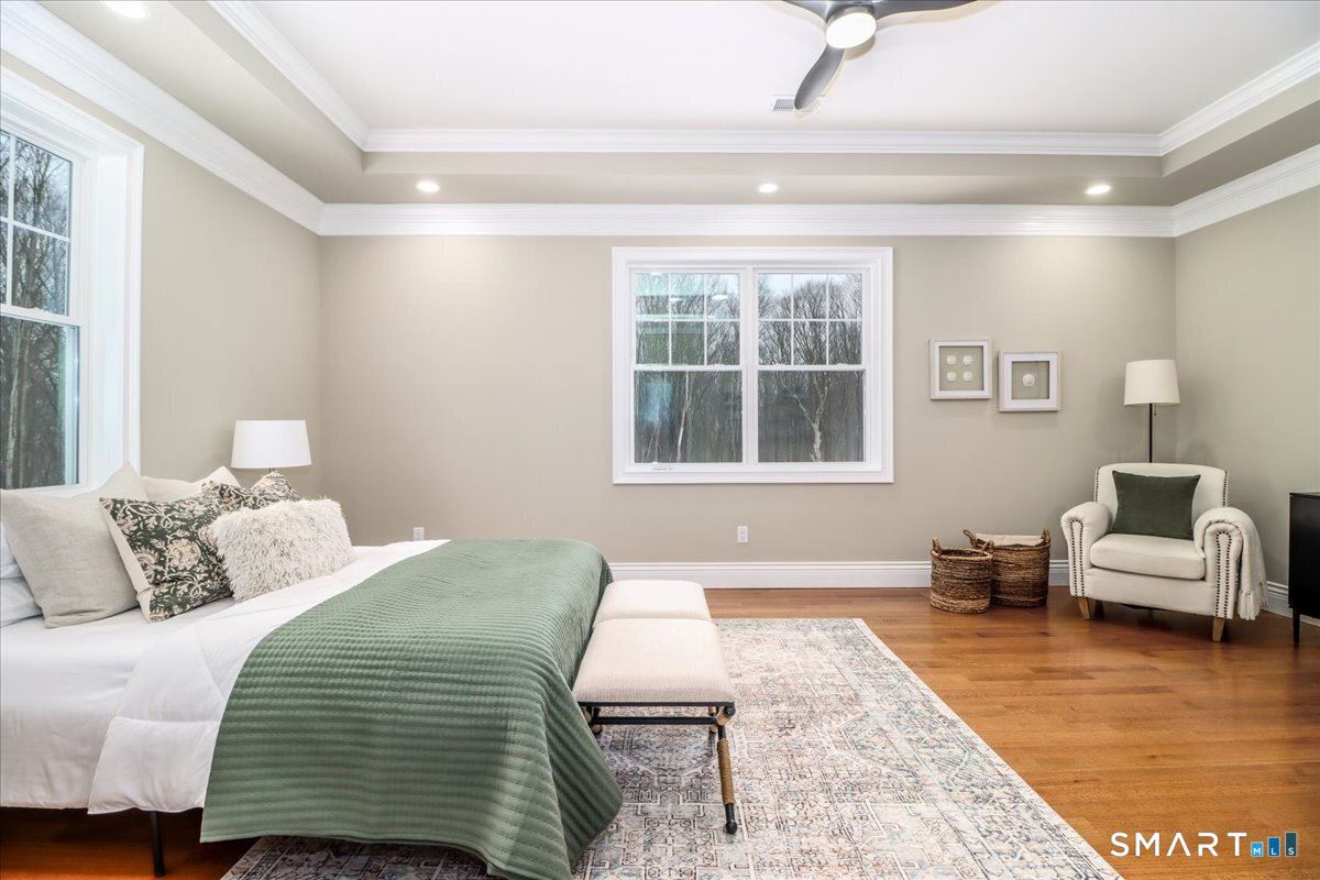 109 Codfish Hill Road Bethel, CT 06801 - Photo 33 of 43 a bedroom with a bed and wooden floor