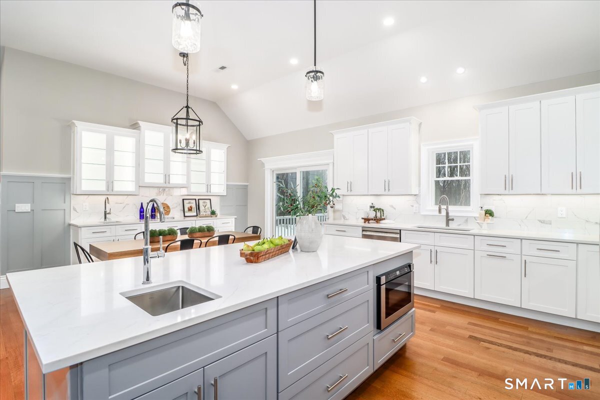 109 Codfish Hill Road Bethel, CT 06801 - Photo 4 of 43 a kitchen with a sink stove and cabinets